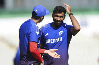Gill and Bumrah in discussion during England nets session.