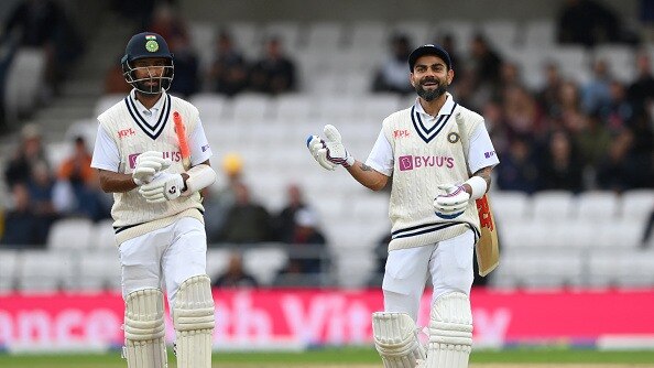  India batsmen Virat Kohli (r) and Cheteshwar Pujara leave the field after day three of the Third Test Match between England and India at Emerald Headingley Stadium